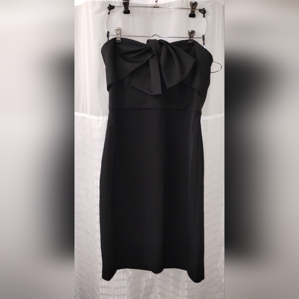 Sam Edelson Strapless mini black dress. Tasteful bow. Inner strap for support.